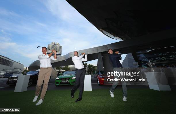 Henrik Stenson of Sweden, Sergio Garcia of Spain and Martin Kaymer of Germany pose for a picture after showing off their chipping skills at the...