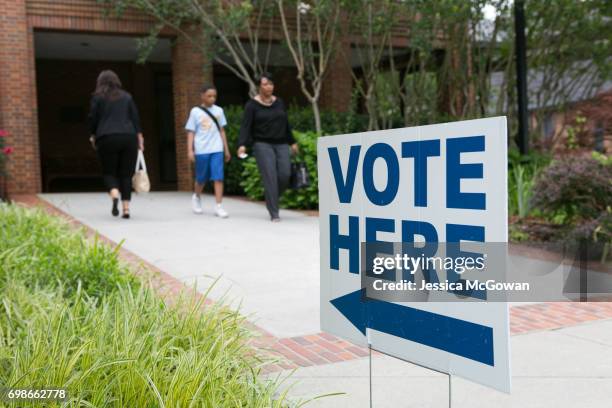 Signs lead voters into the polling location at St. Martin In The Fields Episcopal Church for the special election of Georgia's 6th Congressional...