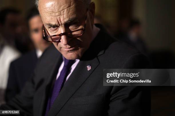 Senate Minority Leader Charles Schumer talks to reporters following the weekly Democratic policy luncheon at the U.S. Capitol June 20, 2017 in...