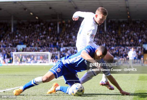 Cardiff City's Lee Peltier and Leeds United's Charlie Taylor battle for the ball