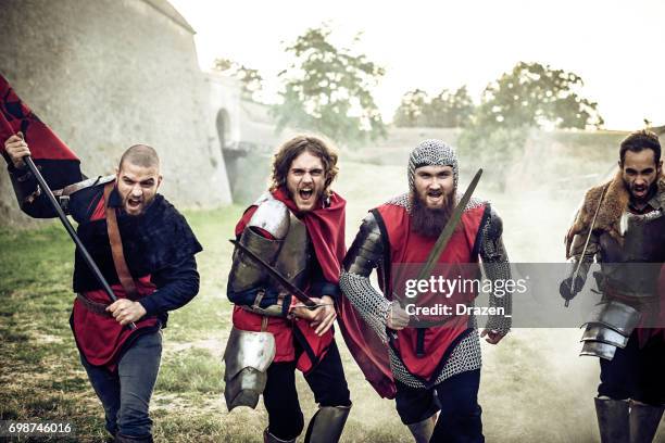 group of brave knights running into battle - army v duke stock pictures, royalty-free photos & images