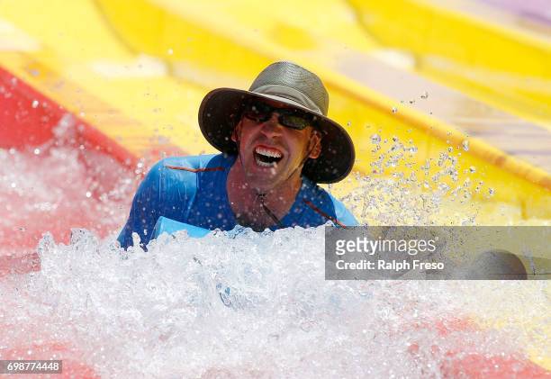 Phoenix area resident finds some relief from the heat on a water slide at the Wet-N-Wild Water Park on June 20, 2017 in Phoenix, Arizona. Record...