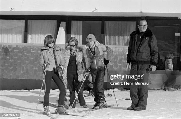 Jacques Chirac, his wife Bernadette and their daughters Claude and Laurence prepare to go skiing in Les Menuires, France, 26th December 1976.