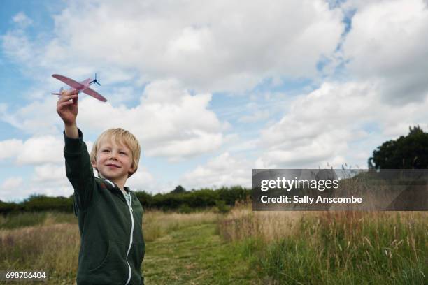 relaxed parenting - toy airplane stock-fotos und bilder