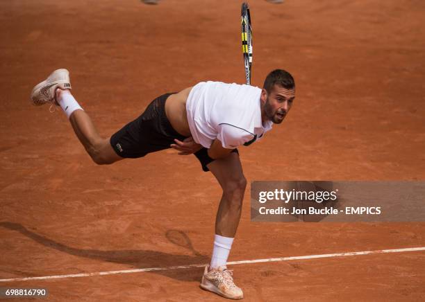 Benoit Paire in action during his 1st round men's singles match against Gastao Elias on day two of the French Open at Roland Garros on May 25, 2015...