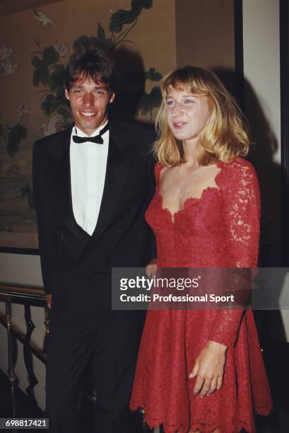 German tennis players Michael Stich and Steffi Graf, champions of the 1991 Wimbledon Championships, pictured together wearing formal evening wear at...