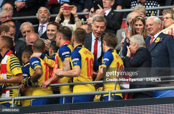 Arsenal shareholder Stan Kroenke congratulates manager Arsene Wenger