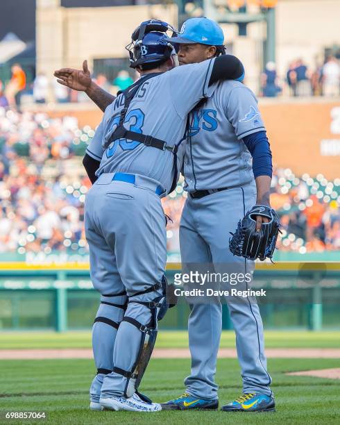Alex Colome of the Tampa Bay Rays gets a hug from catcher Derek Norris after a MLB game against the Detroit Tigers at Comerica Park on June 17, 2017...