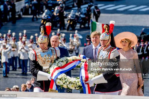 King Willem-Alexander of The Netherlands and Queen Maxima of The Netherlands attend a commemoration ceremony and lay down a wreath at the Altare...
