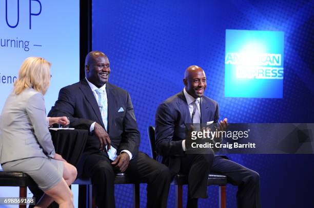Moderator Doris Burke speaks with Shaquille O'Neal and Alonzo Mourning onstage during American Express Teamed Up with Shaquille O'Neal and Alonzo...