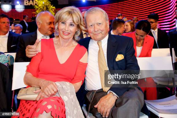 Wolfgang Porsche and his partner Claudia Huebner attend the Deutscher Gruenderpreis on June 20, 2017 in Berlin, Germany.