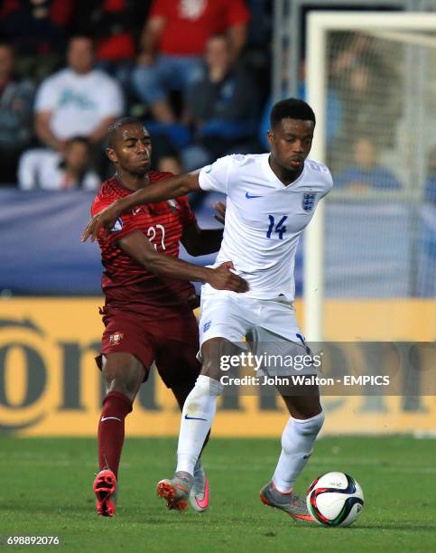 England's Nathaniel Chalobah and Portugal's Ricardo Pereira battle for the ball