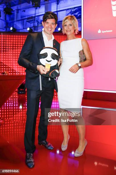 Award winner Florian Michajlezko and German presenter Barbara Hahlweg attend the Deutscher Gruenderpreis on June 20, 2017 in Berlin, Germany.