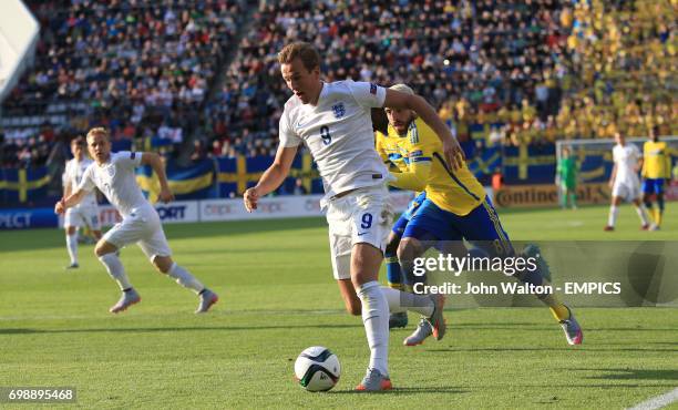 England's Harry Kane runs through on goal