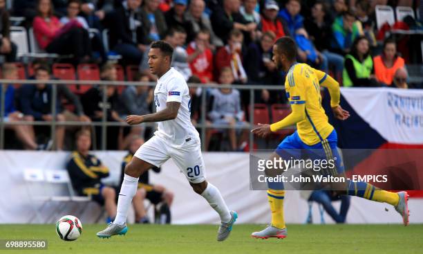 England's Liam Moore gets away from Sweden's Isaac Kiese Thelin