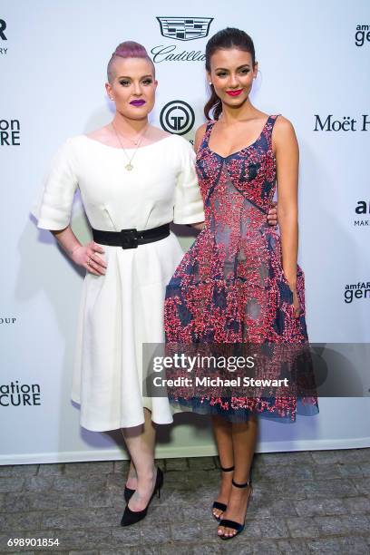 Kelly Osborne and actress Victoria Justice attend amfAR generationCURE Solstice 2017 at Mr. Purple on June 20, 2017 in New York City.