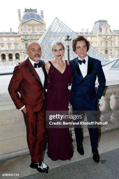 Stylist Christian Louboutin, Melita Toscan du Plantier and EIC Esquire Jay Fielden attend the "Liaisons au Louvre IV" - Evening of patronage for the...