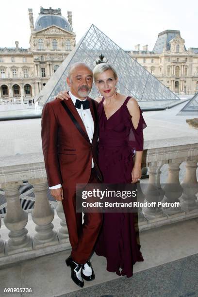 Stylist Christian Louboutin and Melita Toscan du Plantier attend the "Liaisons au Louvre IV" - Evening of patronage for the benefit of the Louvre...