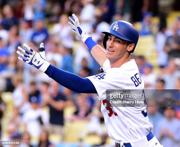 Cody Bellinger of the Los Angeles Dodgers celebrates his two run homerun to take a 4-0 lead over the New York Mets during the first inning at Dodger...