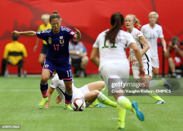 Japan's Yuki Ogimi turns, shoots and scores a goal during the FIFA Women's World Cup Canada 2015 Final match between USA and Japan at BC Place...