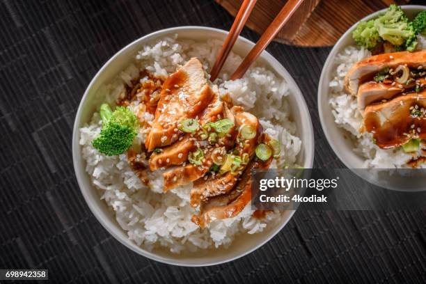 grilled chicken breast with teriyaki sauce over steamed rice - soy sauce stock pictures, royalty-free photos & images