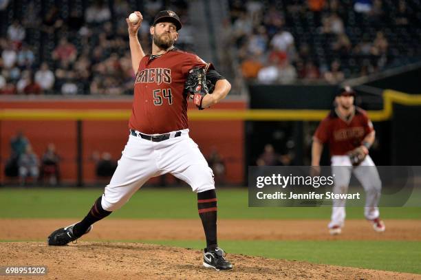 Tom Wilhelmsen of the Arizona Diamondbacks delivers a pitch in the sixth inning of the MLB game against the Chicago White Sox at Chase Field on May...