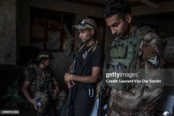 Commando of 7 men of the 1st brigade of the ISOF fights Daesh, house by house, to take control of Al Saha, one of the last districts of Mosul be...