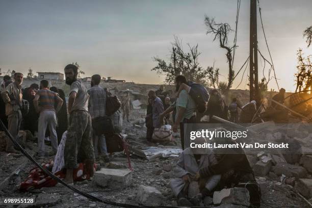 Hundreds of exhausted and panicked civilians flee Bab Sinjar, Zanjili and Abi Tamam, the 3 districts on the north side of Mosul's Old City, which is...