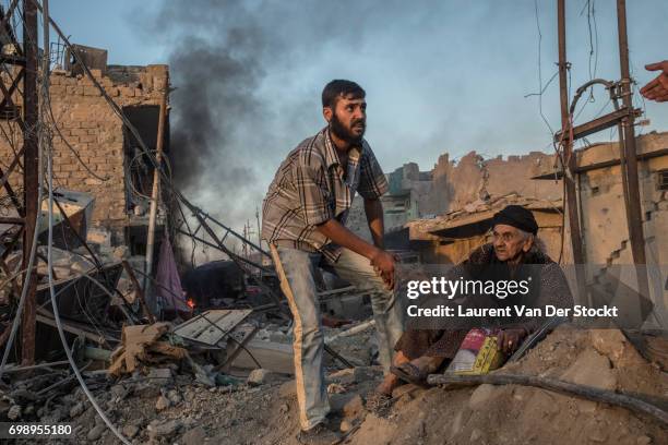 Hundreds of exhausted and panicked civilians flee Bab Sinjar, Zanjili and Abi Tamam, the 3 districts on the north side of Mosul's Old City, which is...