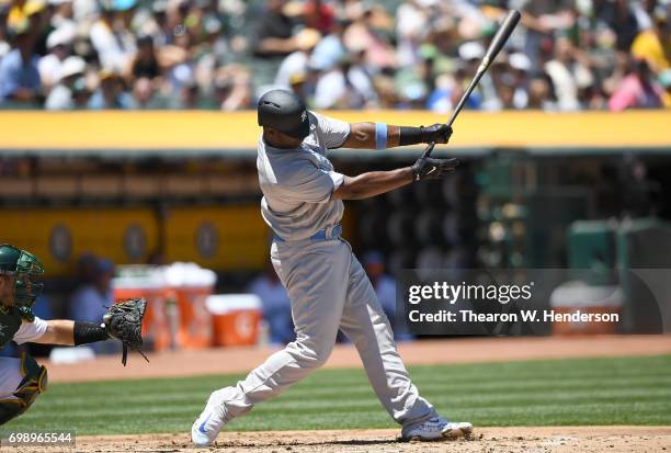 Chris Carter of the New York Yankees bats against the Oakland Athletics in the top of the second inning at Oakland Alameda Coliseum on June 18, 2017...