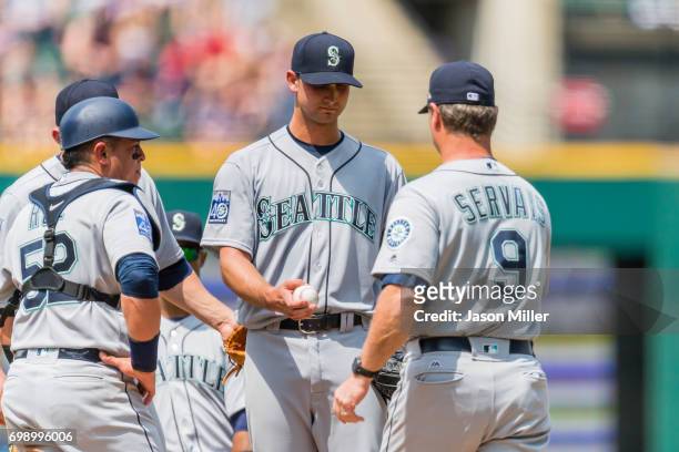 Starting pitcher Chase De Jong of the Seattle Mariners is removed from the game by manager Scott Servais during the third inning against the...