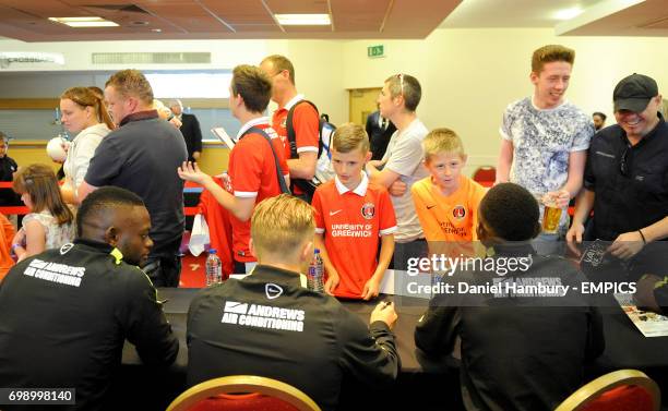 Charlton Athletic supporters meet players during a signing session on fun day.