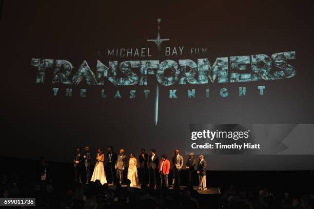 Cast and Crew speak onstate at the US premiere of "Transformers: The Last Knight" at the Civic Opera House on June 20, 2017 in Chicago, Illinois.