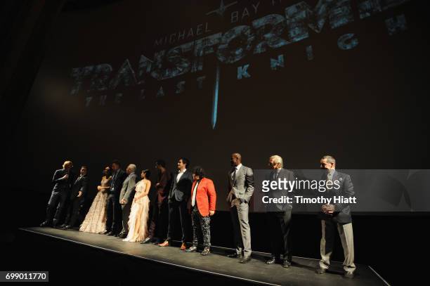 Cast and Crew speak onstate at the US premiere of "Transformers: The Last Knight" at the Civic Opera House on June 20, 2017 in Chicago, Illinois.