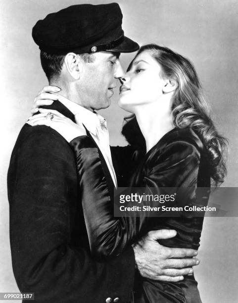 Actors Lauren Bacall as Marie 'Slim' Browning and Humphrey Bogart as Harry Morgan in a promotional still for the film 'To Have and Have Not', 1944.