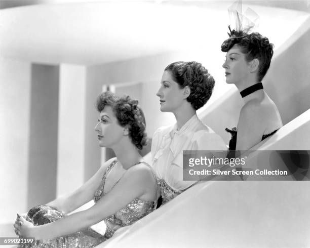 From left to right, actors Joan Crawford as Crystal Allen, Norma Shearer as Mrs. Stephen Haines and Rosalind Russell as Mrs. Howard Fowler in a...