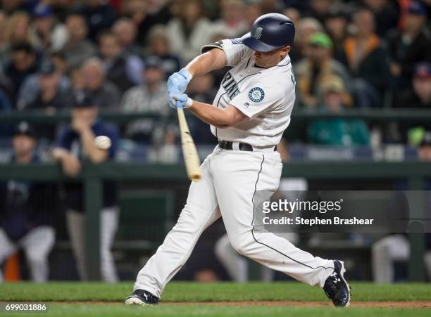 Kyle Seager of the Seattle Mariners hits a walk off RBI-single off of relief pitcher Justin Wilson of the Detroit Tigers that scored Tyler Smith of...