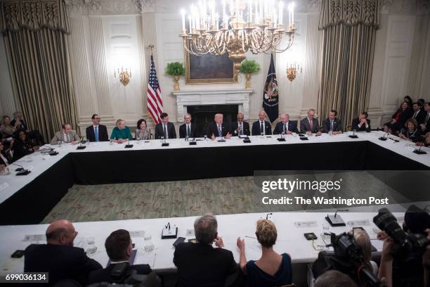 President Donald Trump speaks during an American Technology Council roundtable in the State Dinning Room at the White House in Washington, DC on...