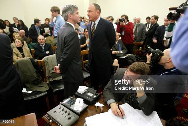 Former Enron Chief Financial Officer Andrew S. Fastow speaks with his attorney John Keker as a court reporter rests his head during a break in the...