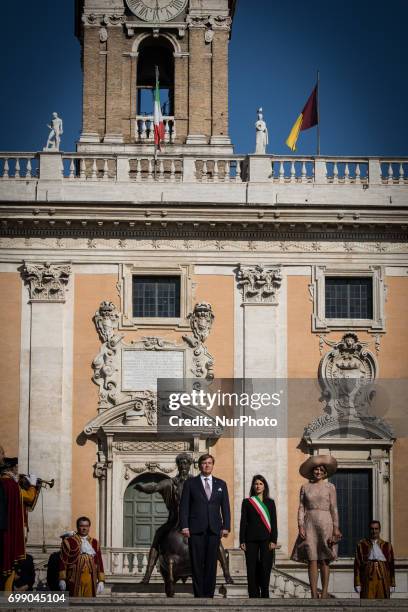 King Willem-Alexander of The Netherlands, Queen Maxima of The Netherlands and Mayor of Rome Virginia Raggi pose in the front of the Campidoglio after...