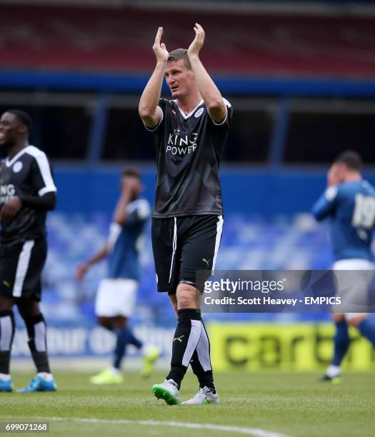 Leicester City's Robert Huth applauds the fans