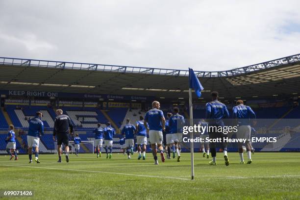 Birmingham City players make their way out for the warm-up