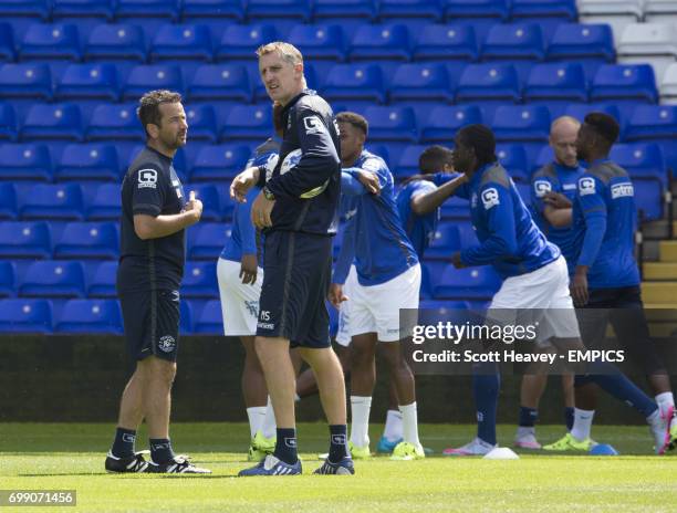 Birmingham City first team coach Mark Sale speaks with Birmingham City Head of sport science Dave Carolan during the warm-up