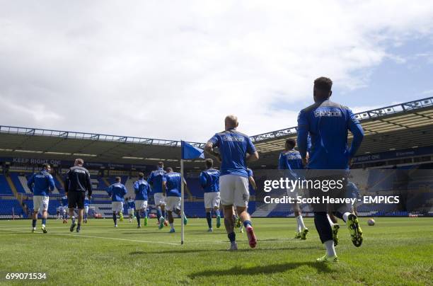 Birmingham City players make their way out for the warm-up
