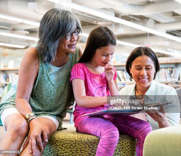 Multi Generational Library Multi Generational Family Reading Book Photos and Premium High Res ...