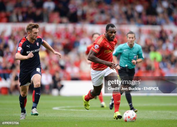 Rotherham United's Lee Frecklington battles for the ball against Nottingham Forest's Michail Antonio