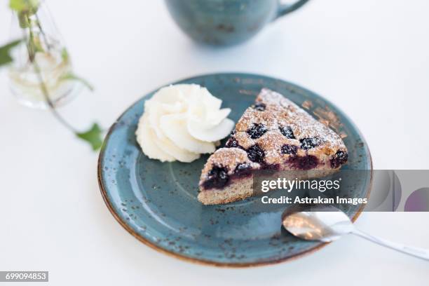 slice of blueberry pie - blueberry pie stock pictures, royalty-free photos & images