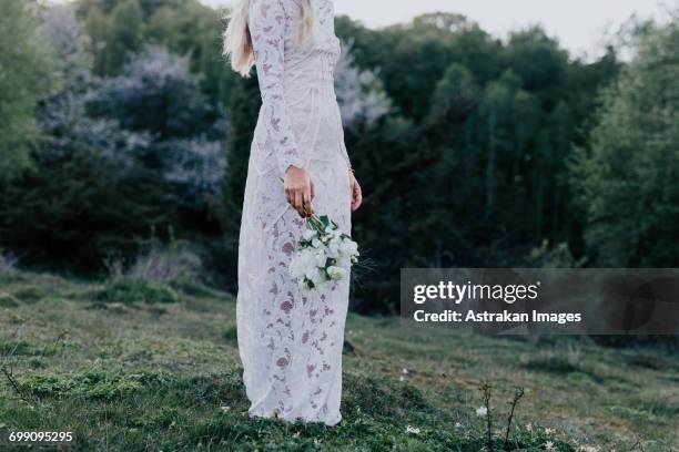 bride with bouquet - lower bildbanksfoton och bilder