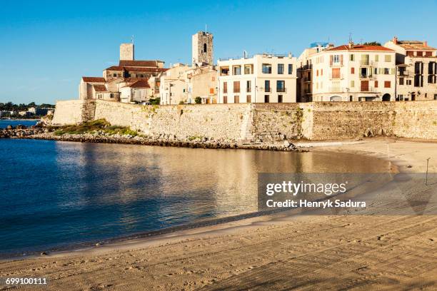 gravette beach in antibes. antibes, provence-alpes-cote dazur, france. - antibes stock pictures, royalty-free photos & images