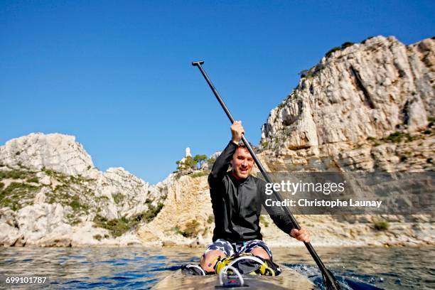 stroll, stand up paddle, and sip along the marseille calanques. - calanques stock pictures, royalty-free photos & images